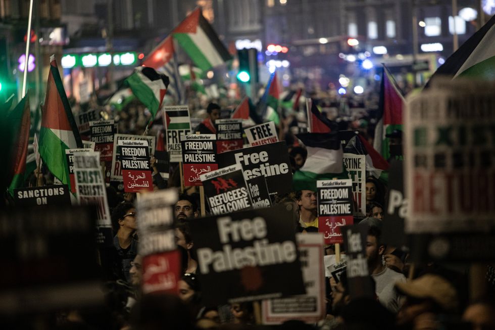 Thousands of pro-Palestine demonstrators protest outside the Israeli Embassy