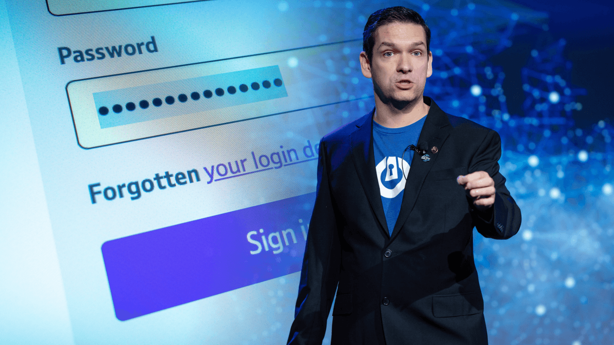 threatlocker ceo danny jenkins speaking on-stage with an inset image showing a password input field
