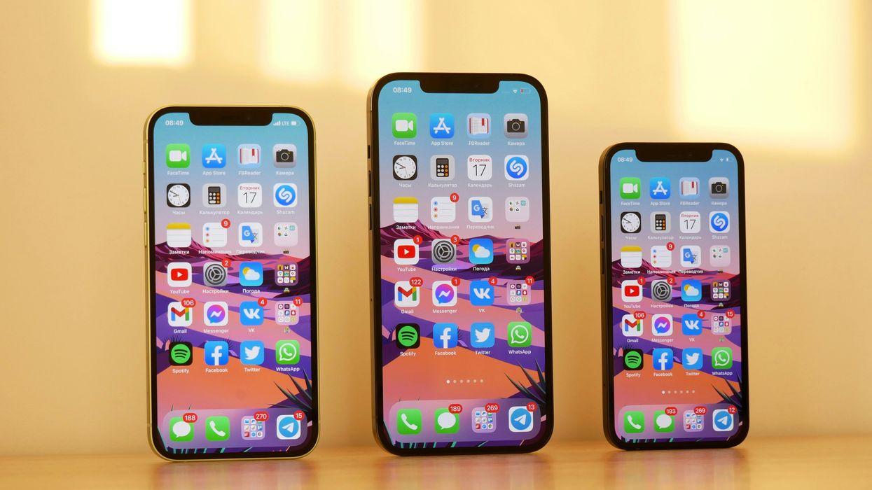 three iphone models pictured with ios app icons on an orange background