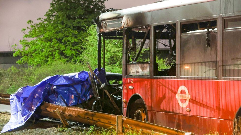 Three people have died after a car collided with a bus near Heathrow Airport last night