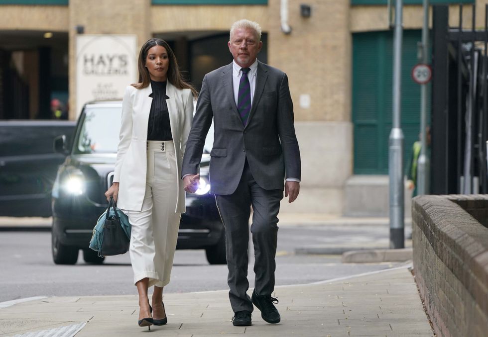 Three-time Wimbledon champion Boris Becker, arrives alongside partner Lilian de Carvalho Monteiro, for sentencing at Southwark Crown Court, in London, after he was found guilty of four charges under the Insolvency Act during his bankruptcy trial. Picture date: Friday April 29, 2022.