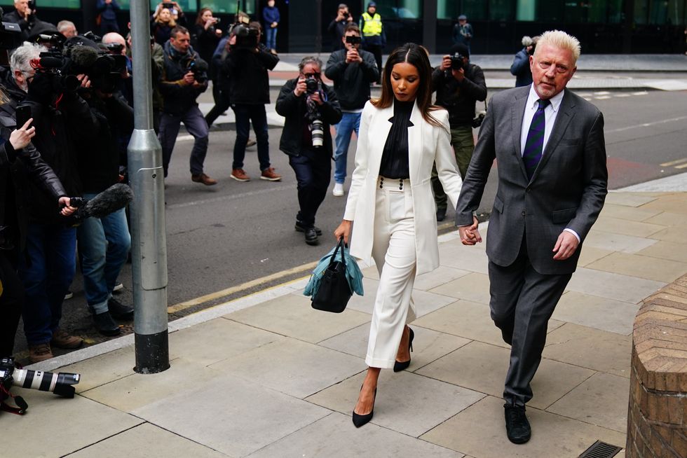 Three-time Wimbledon champion Boris Becker, arrives alongside partner Lilian de Carvalho Monteiro, for sentencing at Southwark Crown Court, in London, after he was found guilty of four charges under the Insolvency Act during his bankruptcy trial. Picture date: Friday April 29, 2022.
