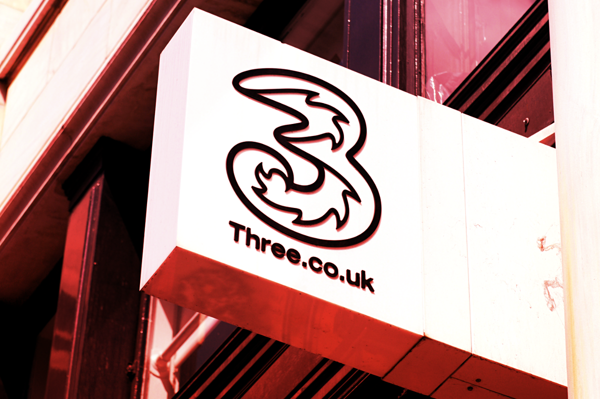 Three UK mobile shop sign outside of UK high street store