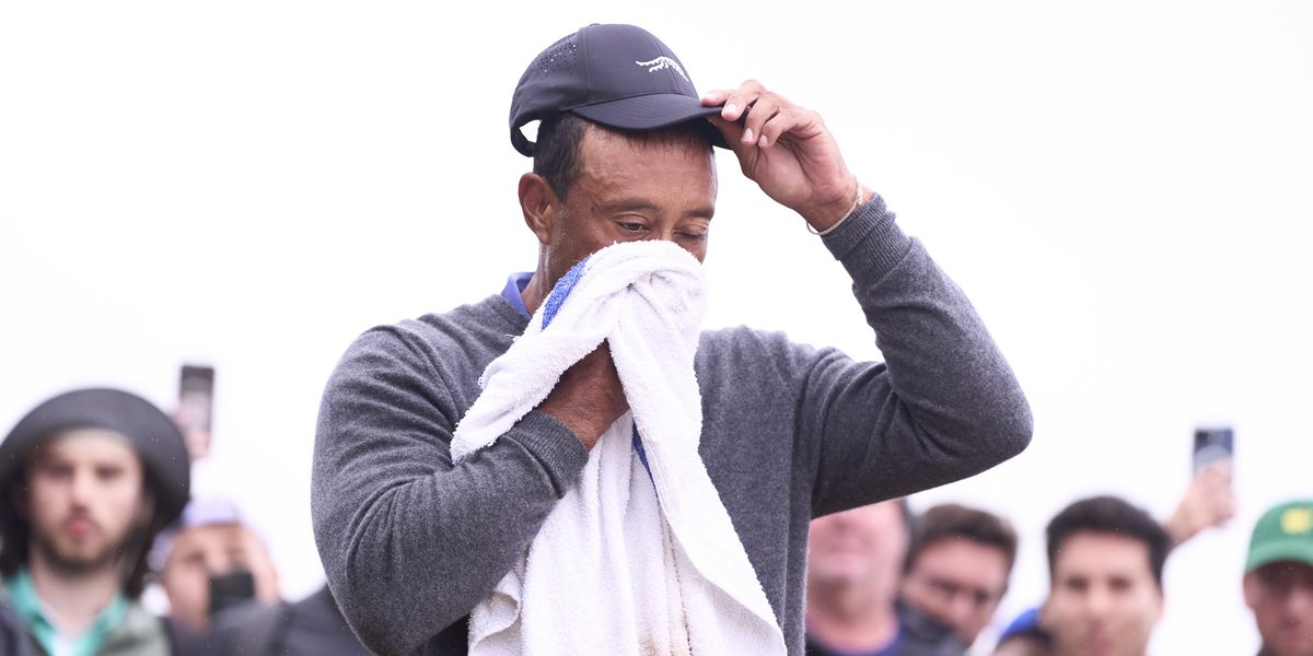 NextImg:Tiger Woods begged to retire after 'embarrassing' Open Championship first round score
