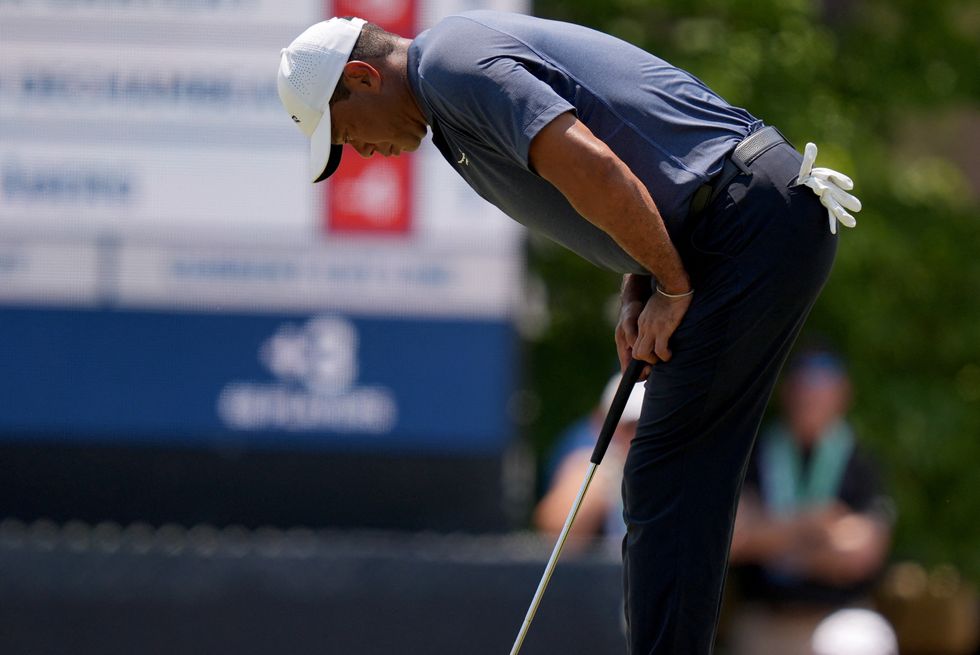 Tiger Woods missed the cut by two shots