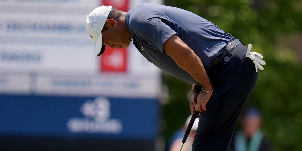 NextImg:Tiger Woods agonisingly misses US Open cut after disastrous few holes as Rory McIlroy in contention