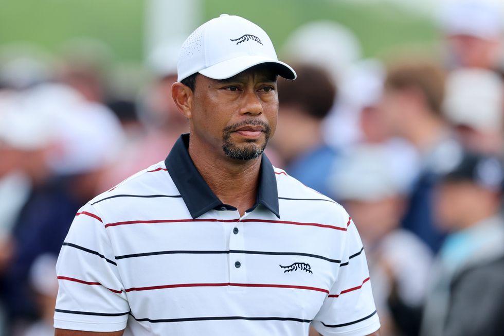Tiger Woods started his round with two triple-bogeys