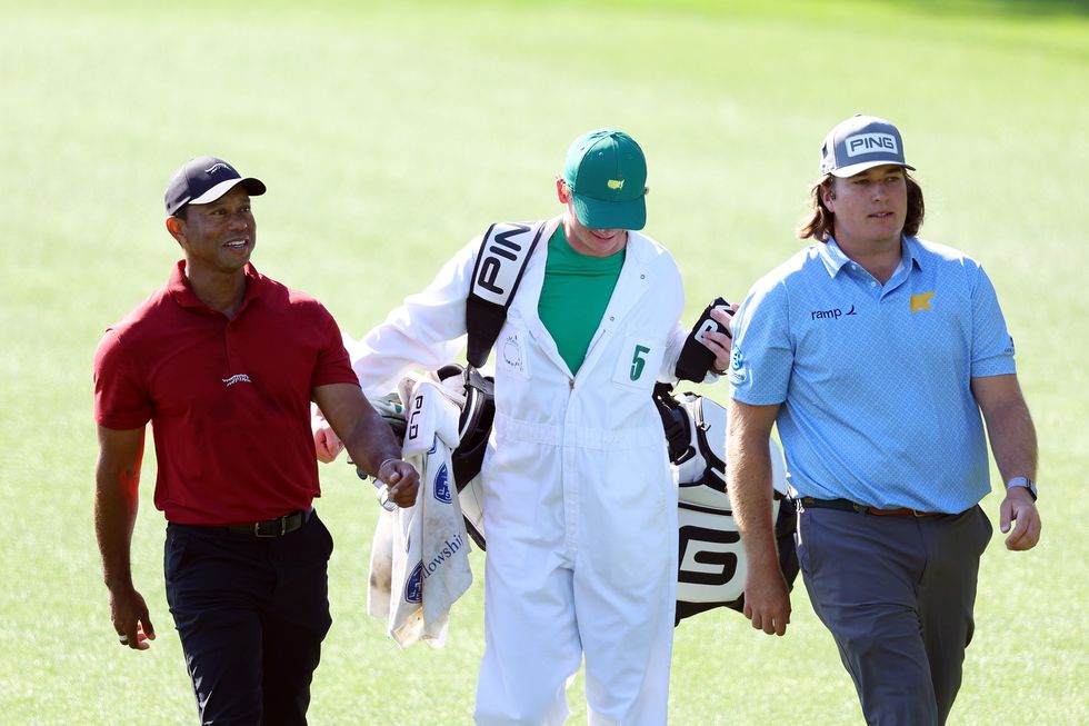 Tiger Woods was seen conversing with Neal Shipley throughout the round