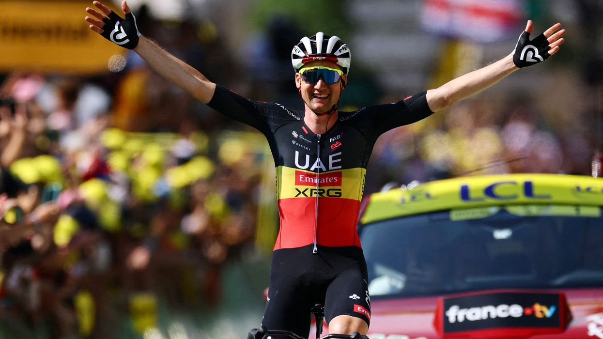 Tim Wellens pictured crossing the line to celebrate winning Stage 15 of the Tour de France