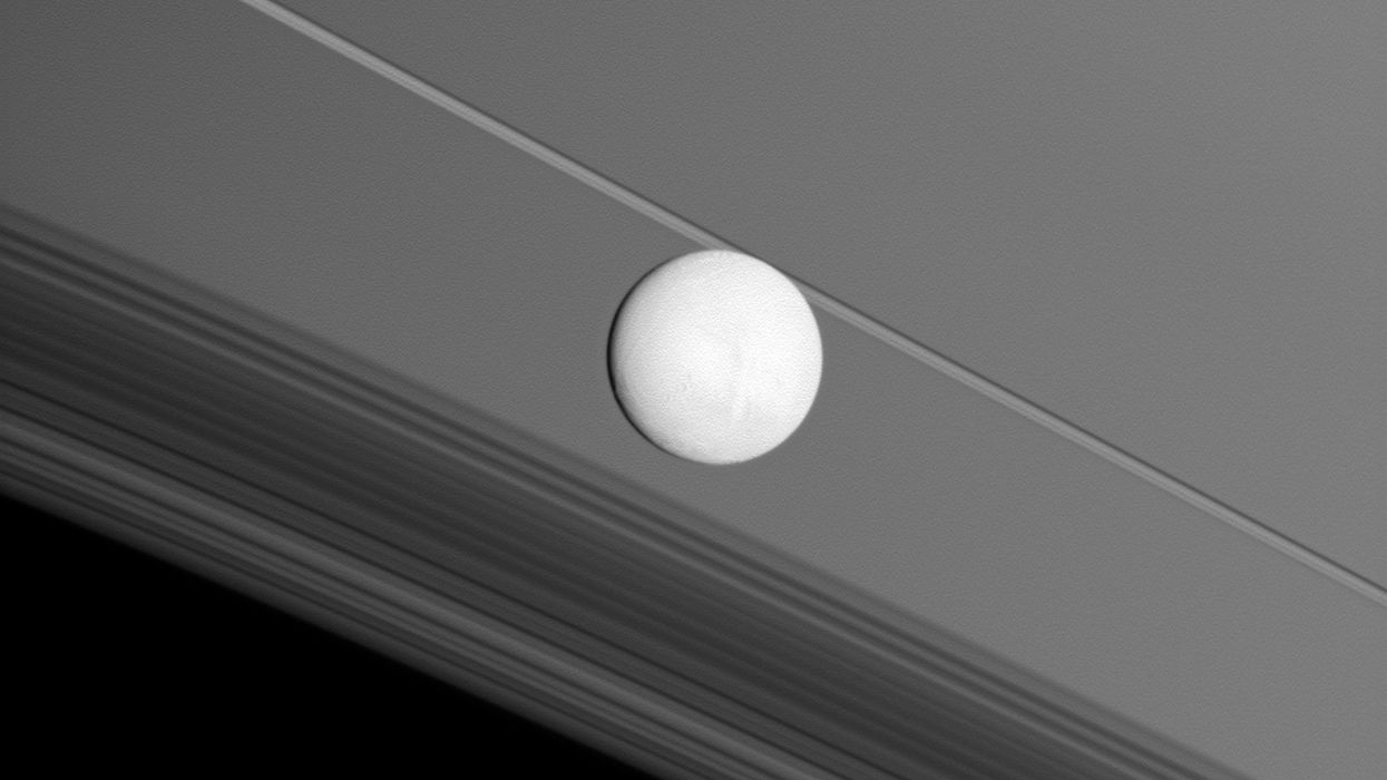 Titan in front of Saturn