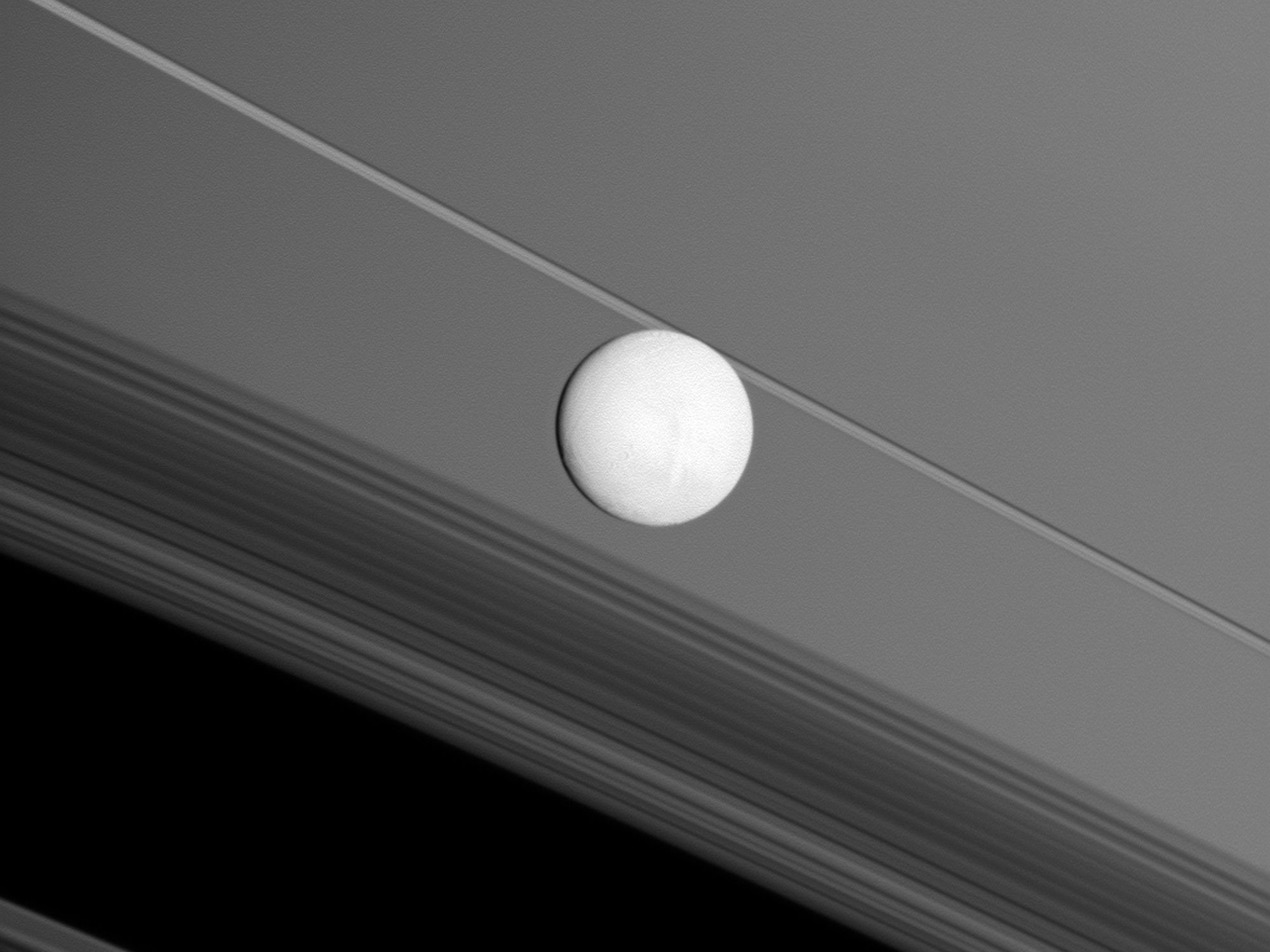 Titan in front of Saturn