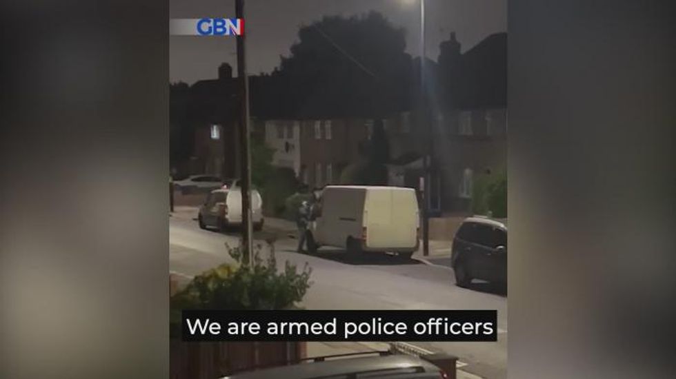 Armed police arrest man at London address following pensioner stabbing – exclusive video