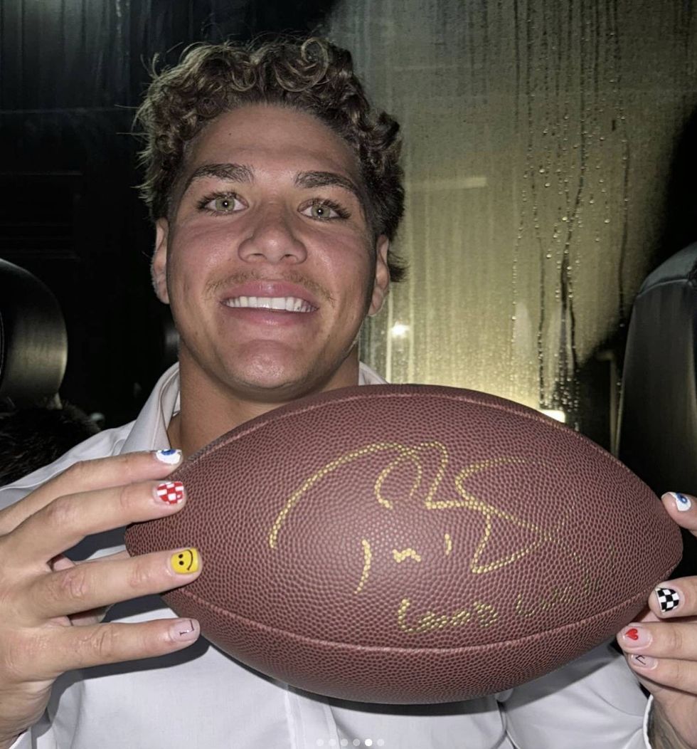 Tom Brady signed the ball for Reece Walsh