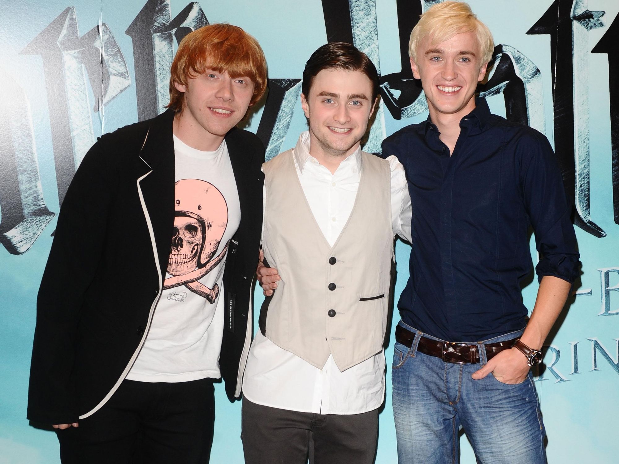 Tom Felton (right)