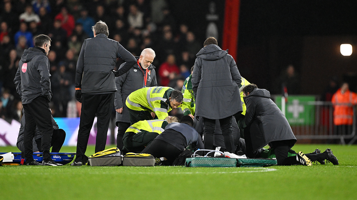 Tom Lockyer is attended to by paramedics