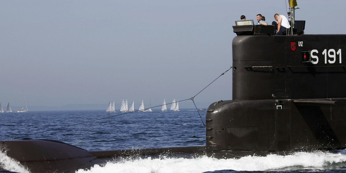 NextImg:Chinese 'spy' arrested in Germany after taking photographs of military property by the port