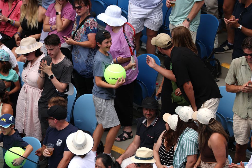 Tommy Paul gifted the broken racket to a young fan