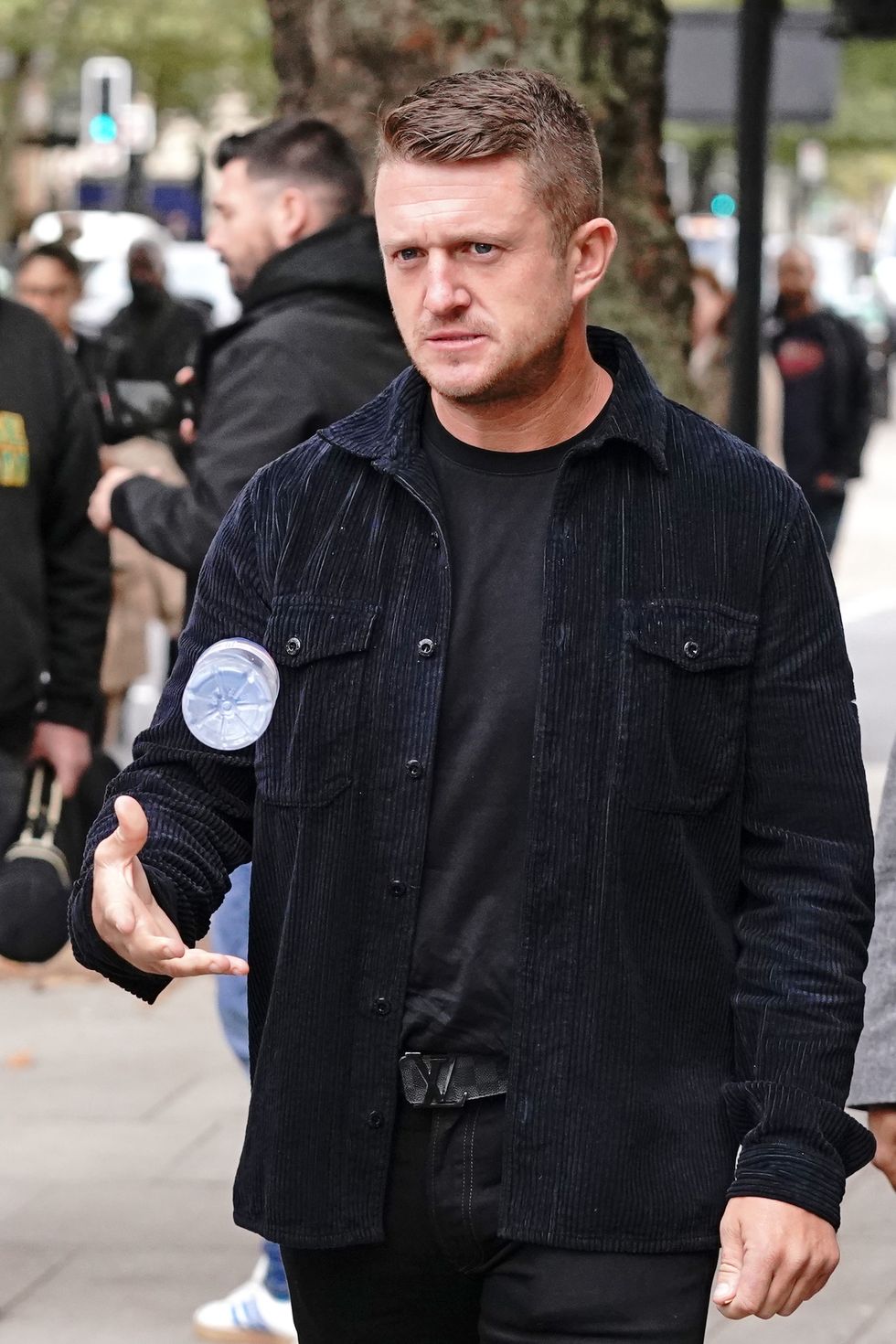 Tommy Robinson arrives at Westminster Magistrates' Court in London for a hearing regarding the stalking of a journalist. Picture date: Wednesday October 13, 2021.