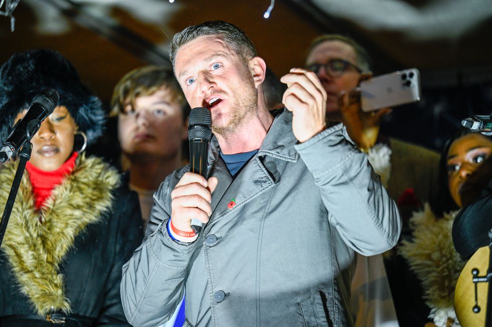Tommy Robinson delivers a speech at the Unite The Kingdom Christian Christmas Event on December 13,