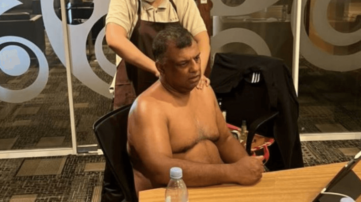 Tony Fernandes received a massage during a meeting