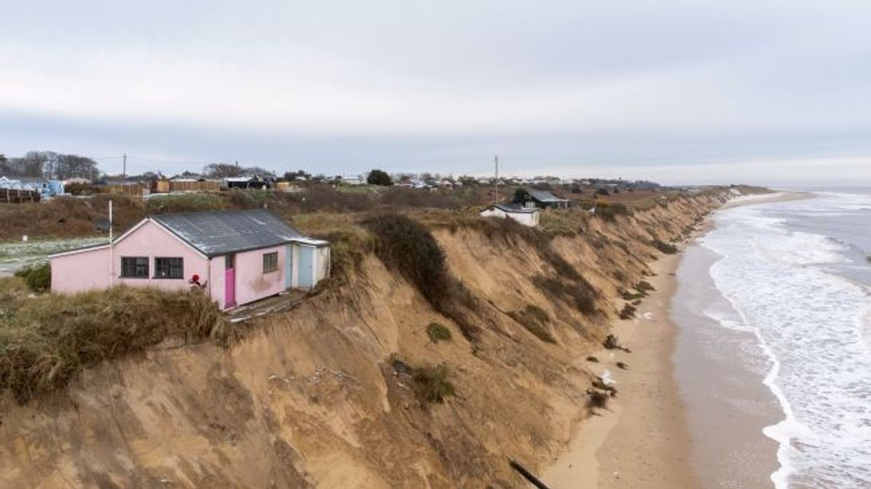 Coastal erosion causing homes in England to slide into the sea