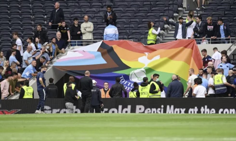 Tottenham fans have been ordered to take down the LGBT flag