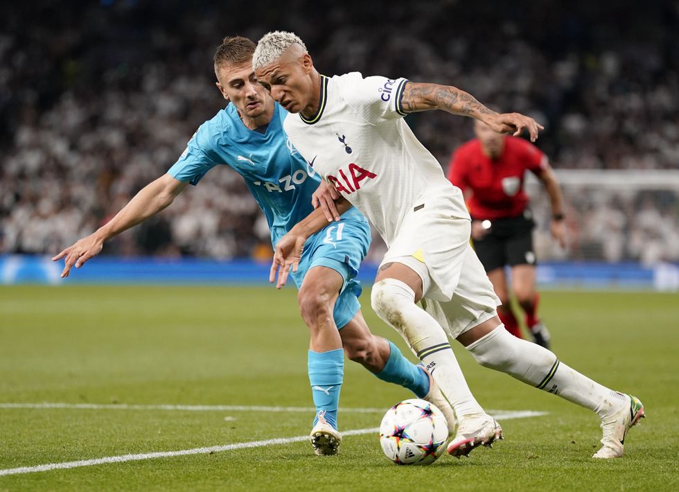 Tottenham Hotspur's Richarlison battles with Marseilles Valentin Rongier during the UEFA Champions League Group D match at the Tottenham Hotspur Stadium, London. Picture date: Wednesday September 7, 2022.