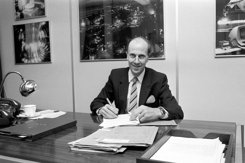 Trade Secretary Norman Tebbit at his desk in Westminster preparing for his first Cabinet meeting at No10 after the Brighton bombing