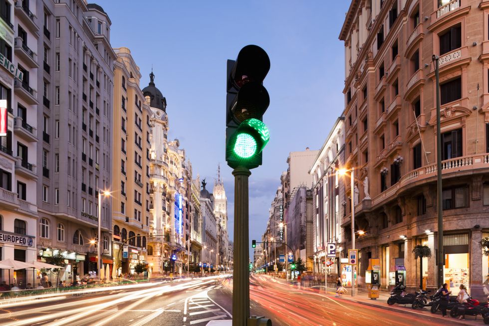 Traffic light on a busy road junction