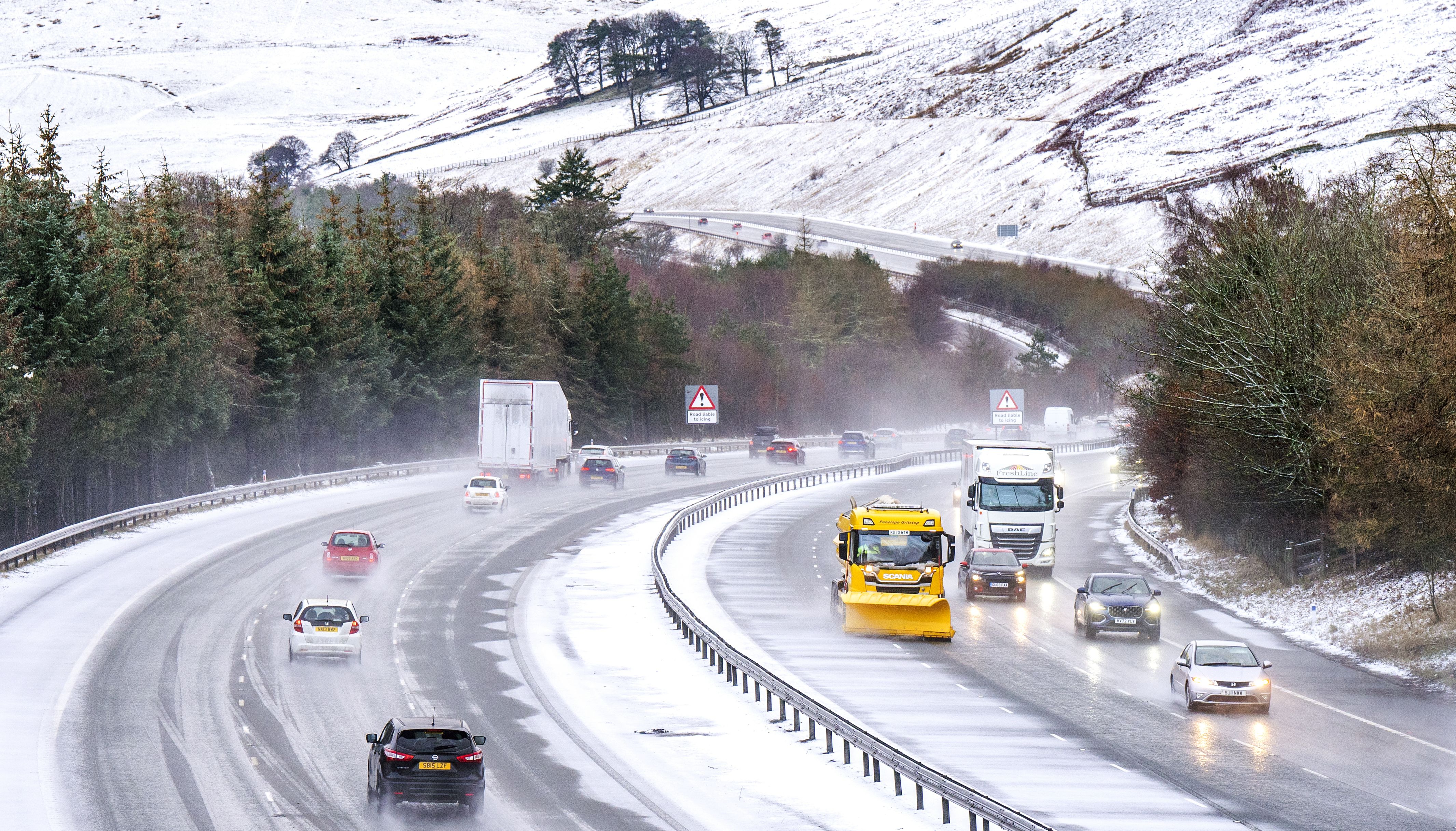 Traffic on the M74 near Abington in South Lanarkshire. A yellow be aware warning for snow and ice has been issued by the Met Office for most of Scotland until 1800 hours tonight. Picture date: Monday December 26, 2022.