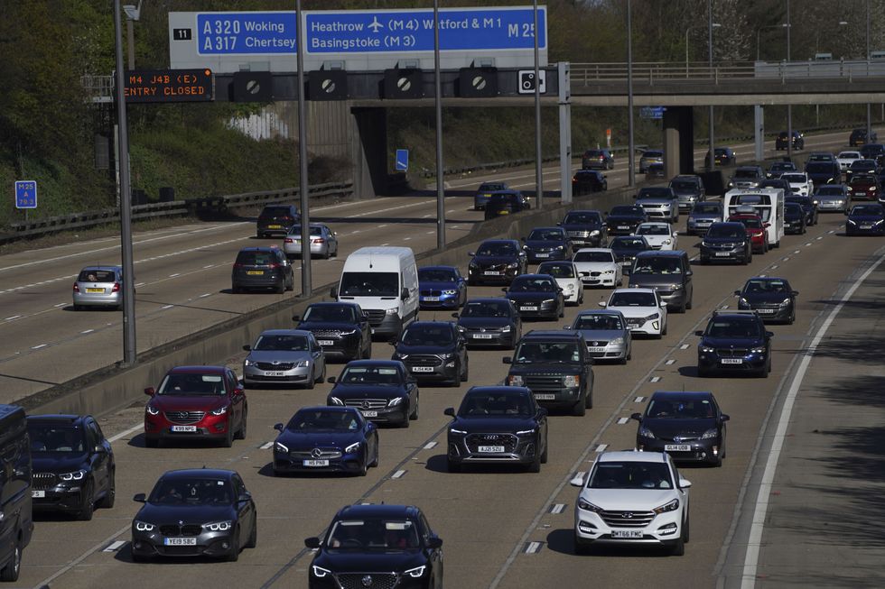 Traffic queues on the M25 near Addlestone, Surrey, as the getaway starts in earnest as schools close for Easter. Picture date: Saturday April 9, 2022.