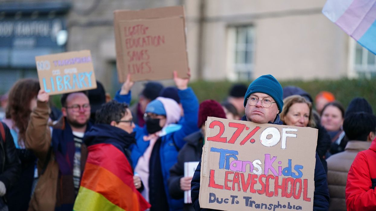 Trans rights activists take part in a demonstration outside Portobello Library, Edinburgh