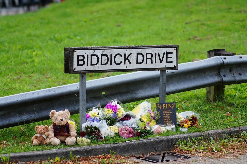 Tributes left in Biddick Drive in the Keyham area of Plymouth where six people, including the offender, died of gunshot wounds in a firearms incident Thursday evening. Picture date: Saturday August 14, 2021.