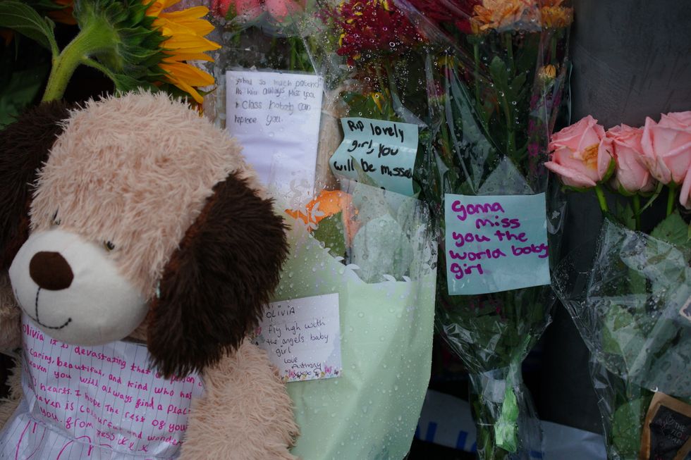 Tributes left in Kingsheath Avenue, Knotty Ash, Liverpool, where nine-year-old Olivia Pratt-Korbel was fatally shot on Monday night. The people of Liverpool have been urged to turn in the masked gunman who killed Olivia as he chased his intended target into her home. Picture date: Wednesday August 24, 2022.