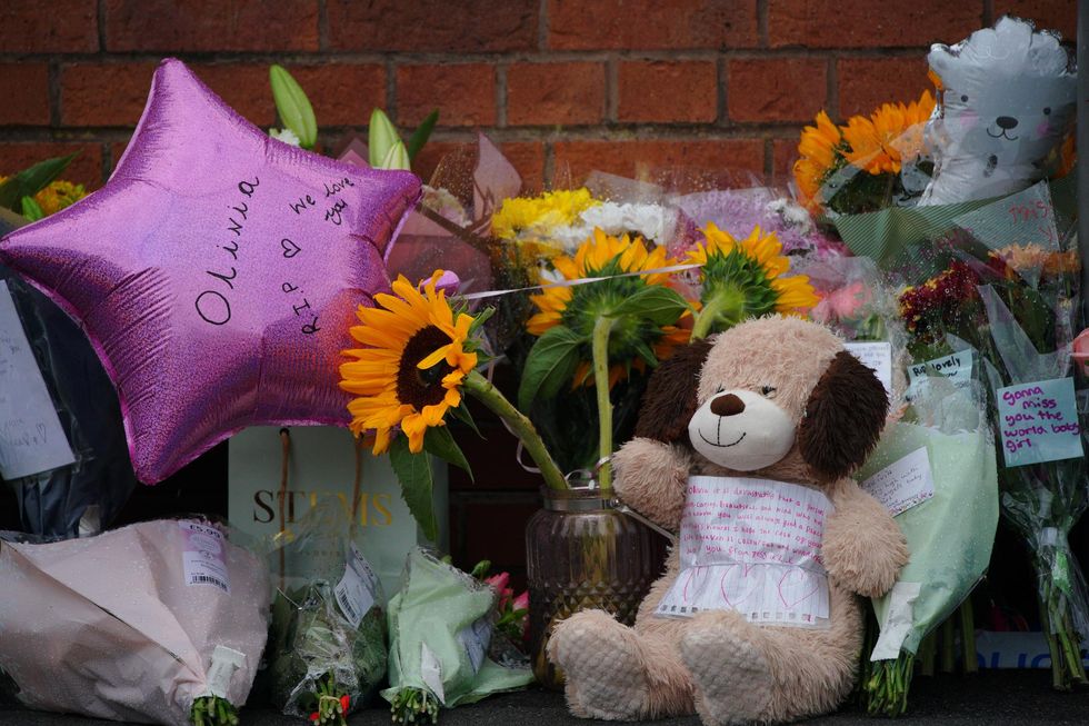 Tributes left in Kingsheath Avenue, Knotty Ash, Liverpool, where nine-year-old Olivia Pratt-Korbel was fatally shot on Monday night