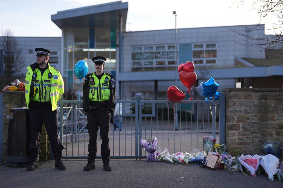 Tributes outside All Saints Catholic High School