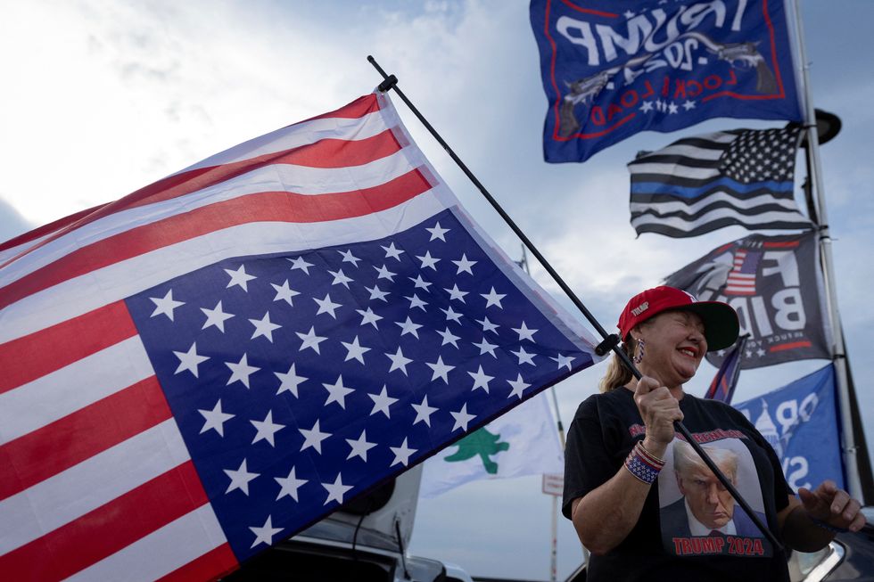 Trump supporter with flags