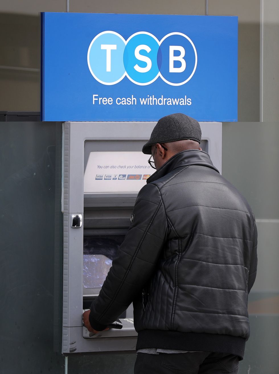 TSB customer uses ATM outside bank branch