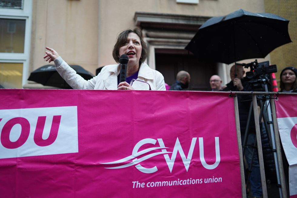 TUC General Secretary Frances O'Grady addresses a mass rally outside Brighton Delivery Office of postal workers, Openreach engineers and call centre staff during Communication Workers Union strike action. Picture date: Thursday October 20, 2022.