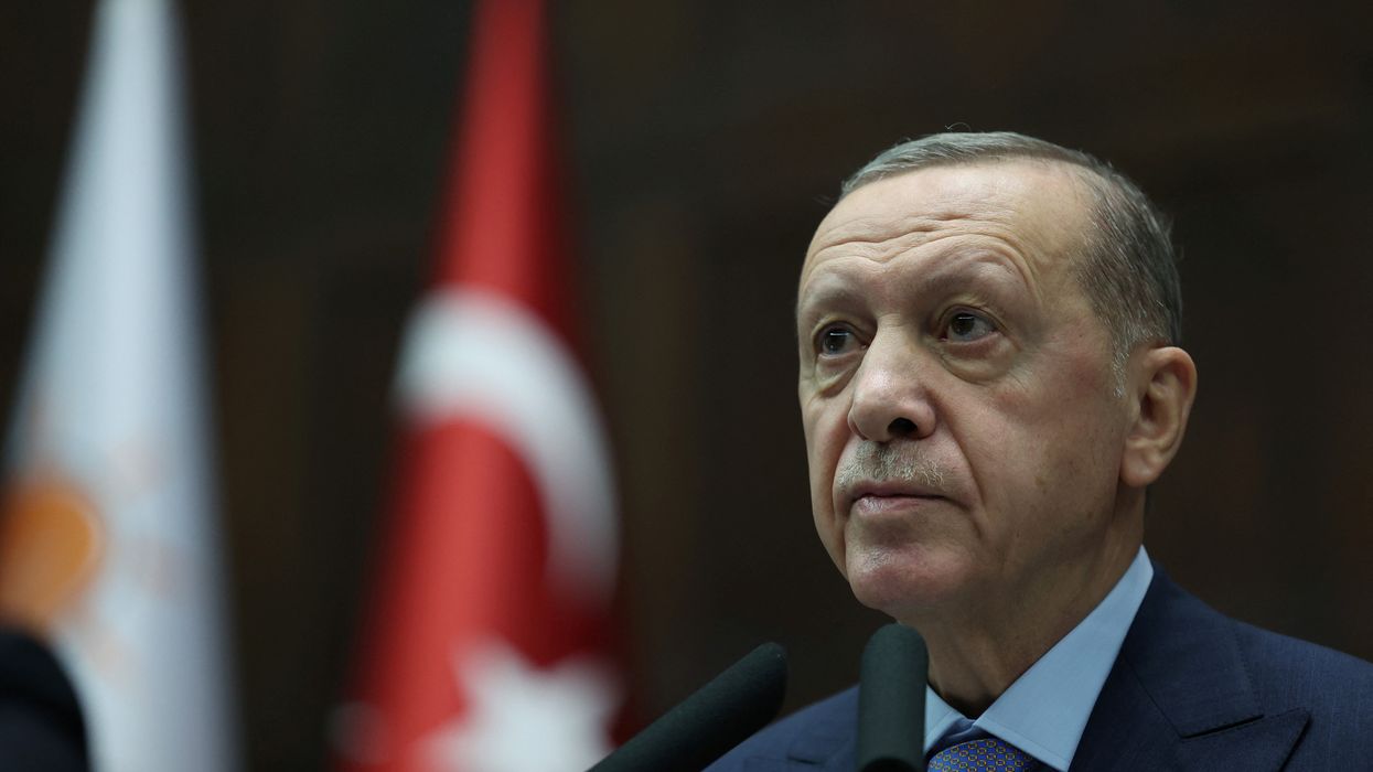 Turkish President Tayyip Erdogan addresses members of parliament from his ruling AK Party
