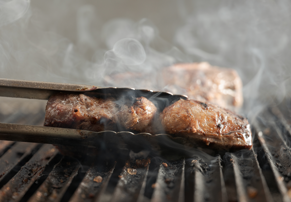 Turning meat on a bbq