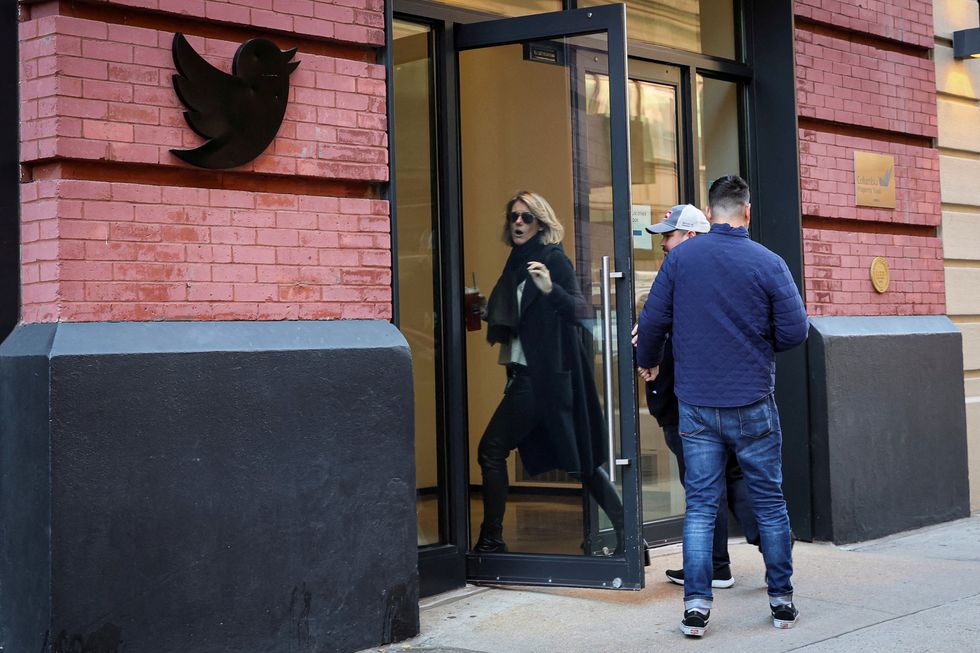 Twitter employees are seen entering the offices in New York City, U.S.