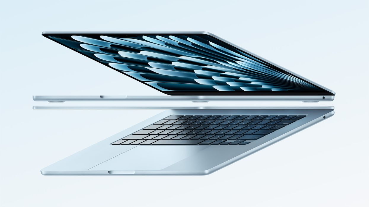 Two Apple MacBook Air M4 13" 2025 half open