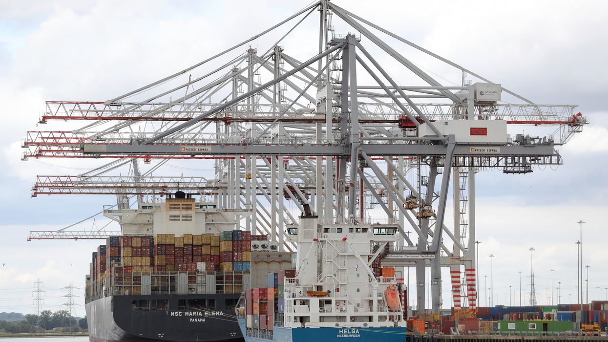 Two container ships unload their cargo whilst in Southampton Docks