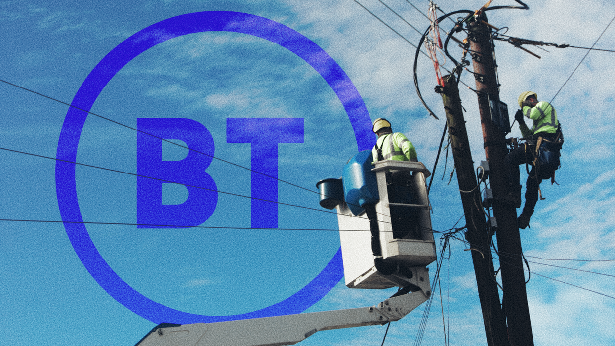 two engineers pictured working on the telephone lines in high-vis jackets with the bt logo in the background