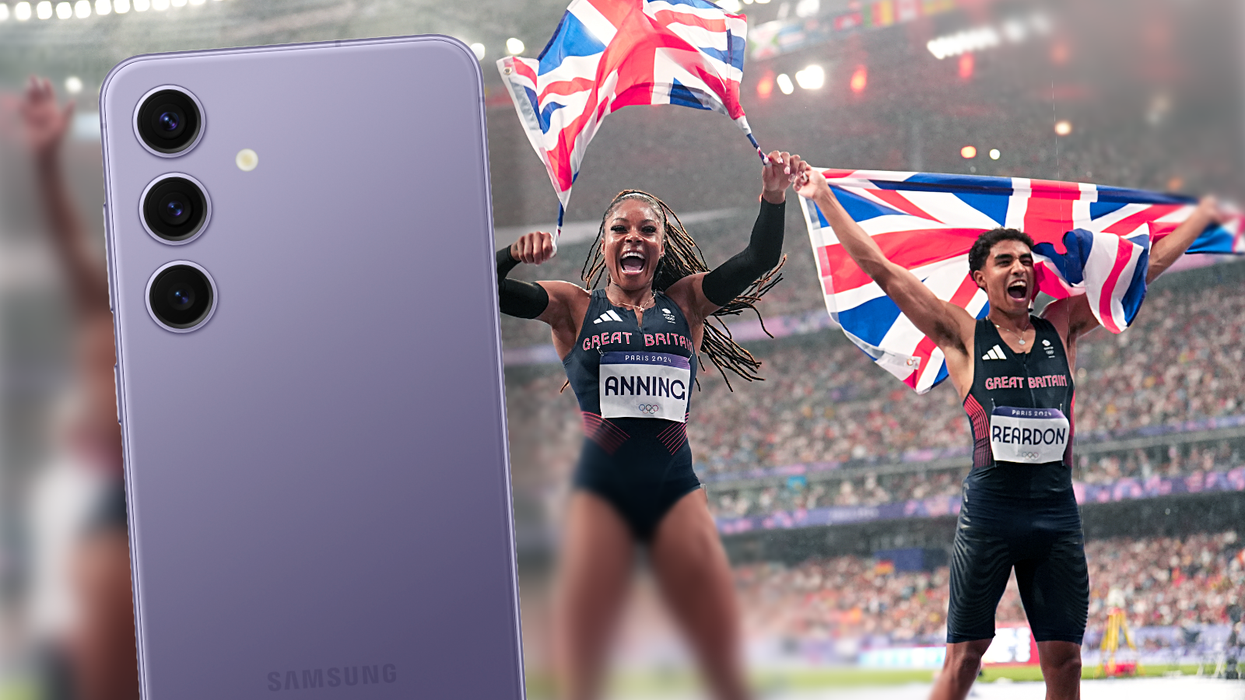 two great britain athletes celebrate in the olympic stadium in Paris france with a galaxy s24 pictured in the foreground