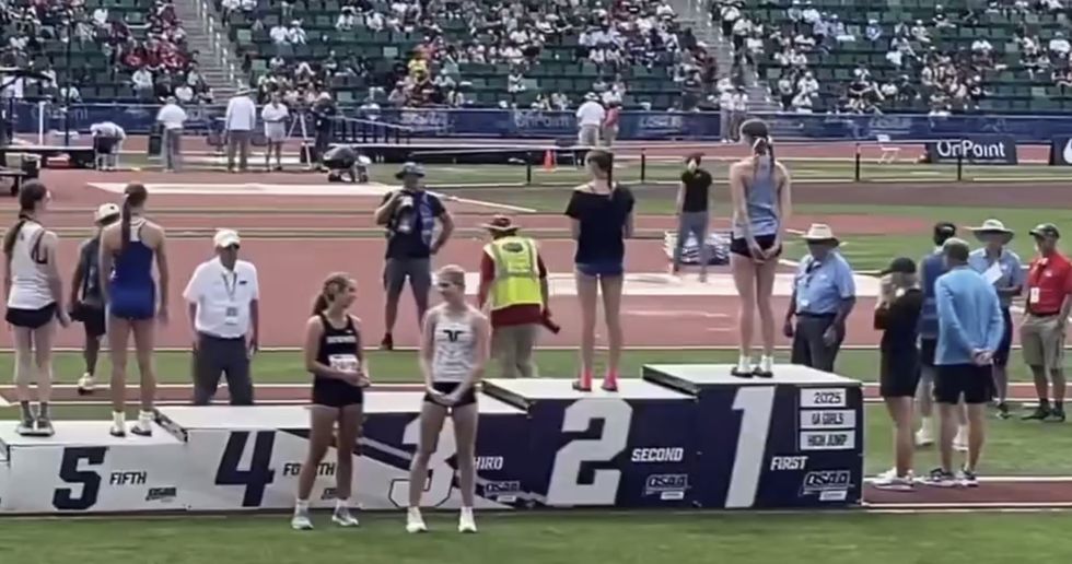 Two high school track and field athletes in Oregon refused to stand on the medal podium alongside a transgender athlete