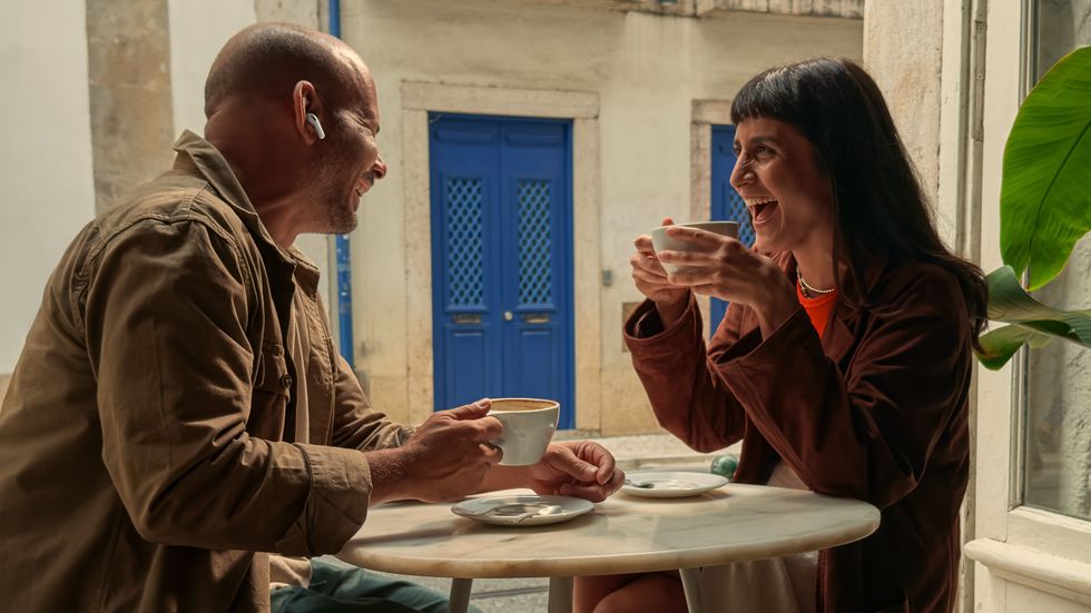 two people chatting with airpods pro