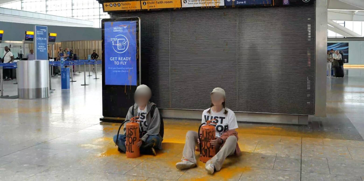 NextImg:Just Stop Oil strike Heathrow Airport terminal with spray paint and sit in protest just a DAY after Gatwick sit-in