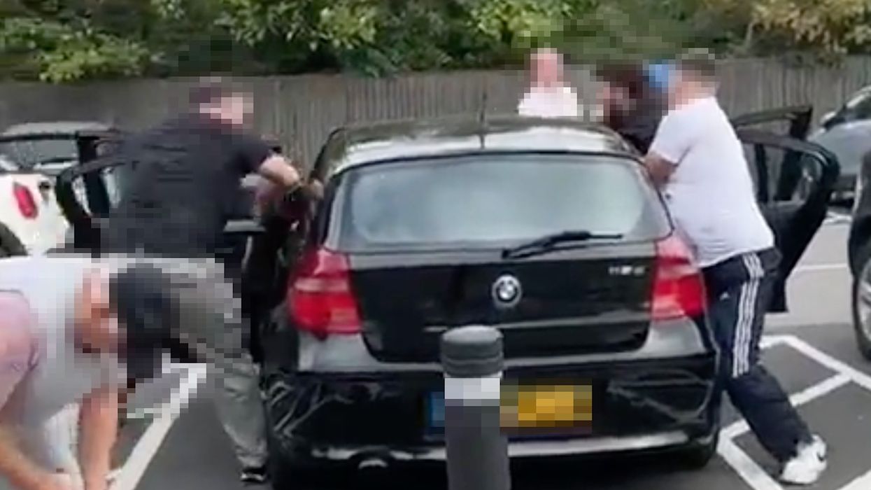 Two suspected thieves were hauled out of a car and detained by members of the public after allegedly being caught shoplifting